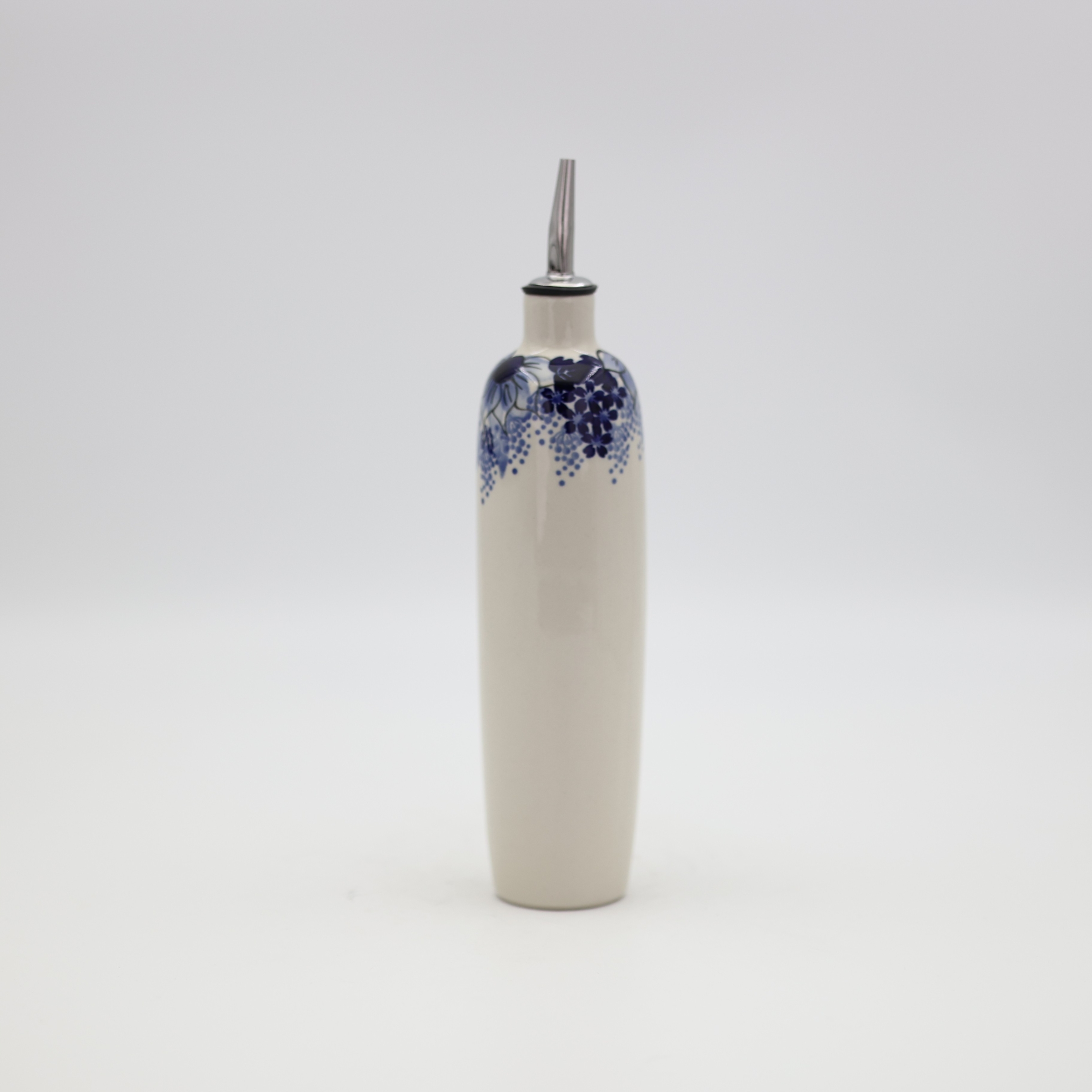 Hand-painted and stamped by master artisans in Bolesławiec, Poland.