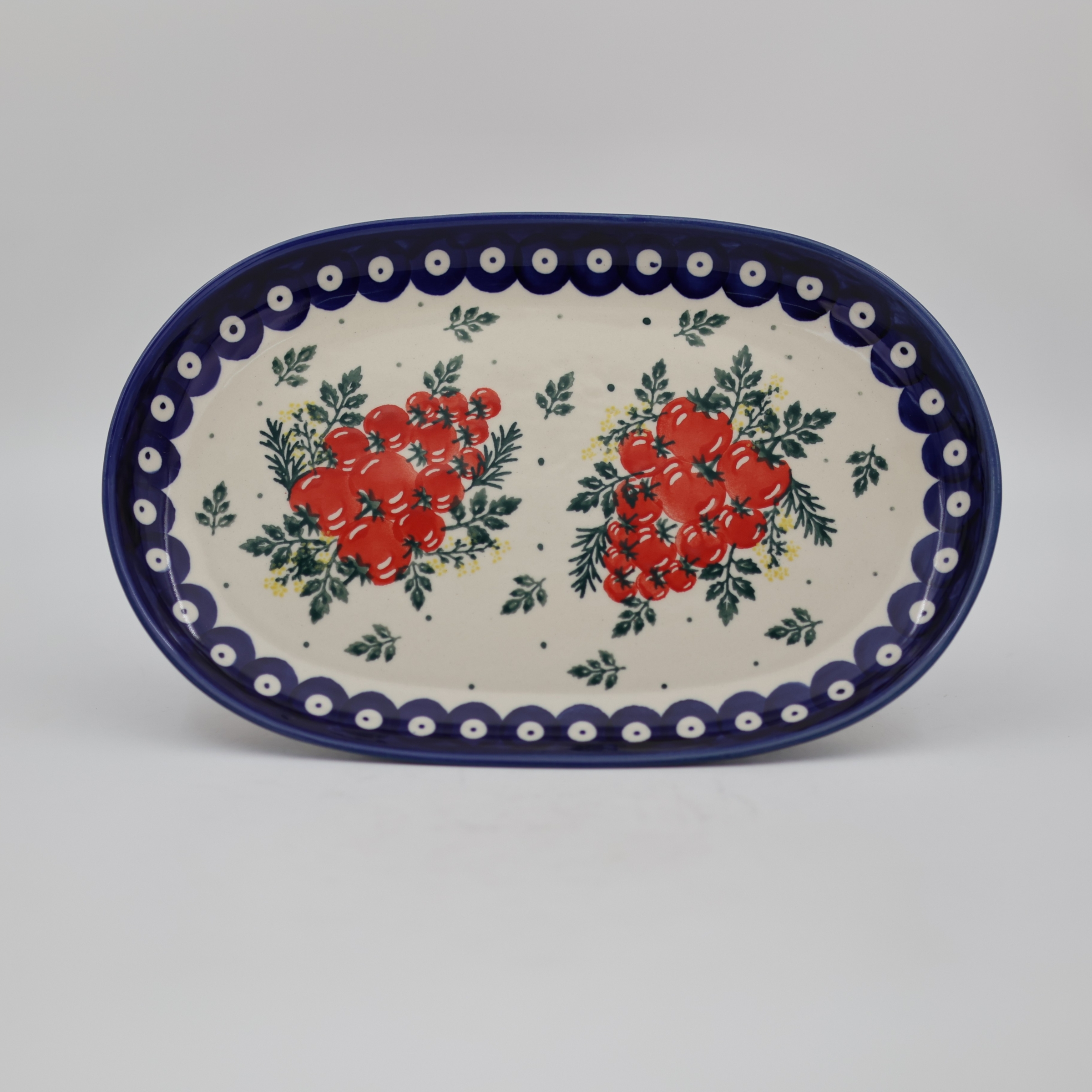 Authentic Polish pottery oval platter from Bolesławiec – perfect for serving appetizers, meats, and side dishes.