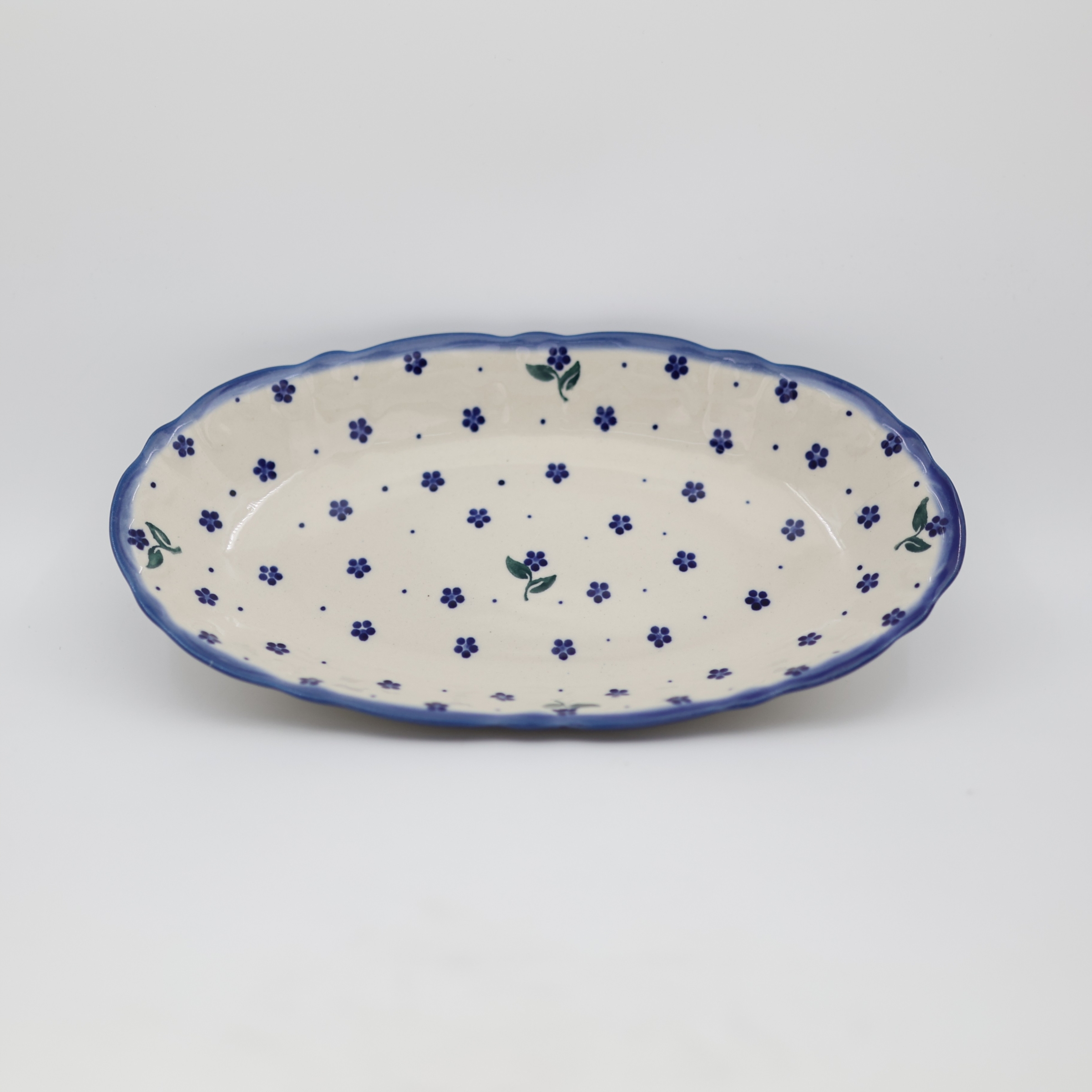 Authentic Polish pottery small embossed platter from Bolesławiec – perfect for appetizers and side dishes.