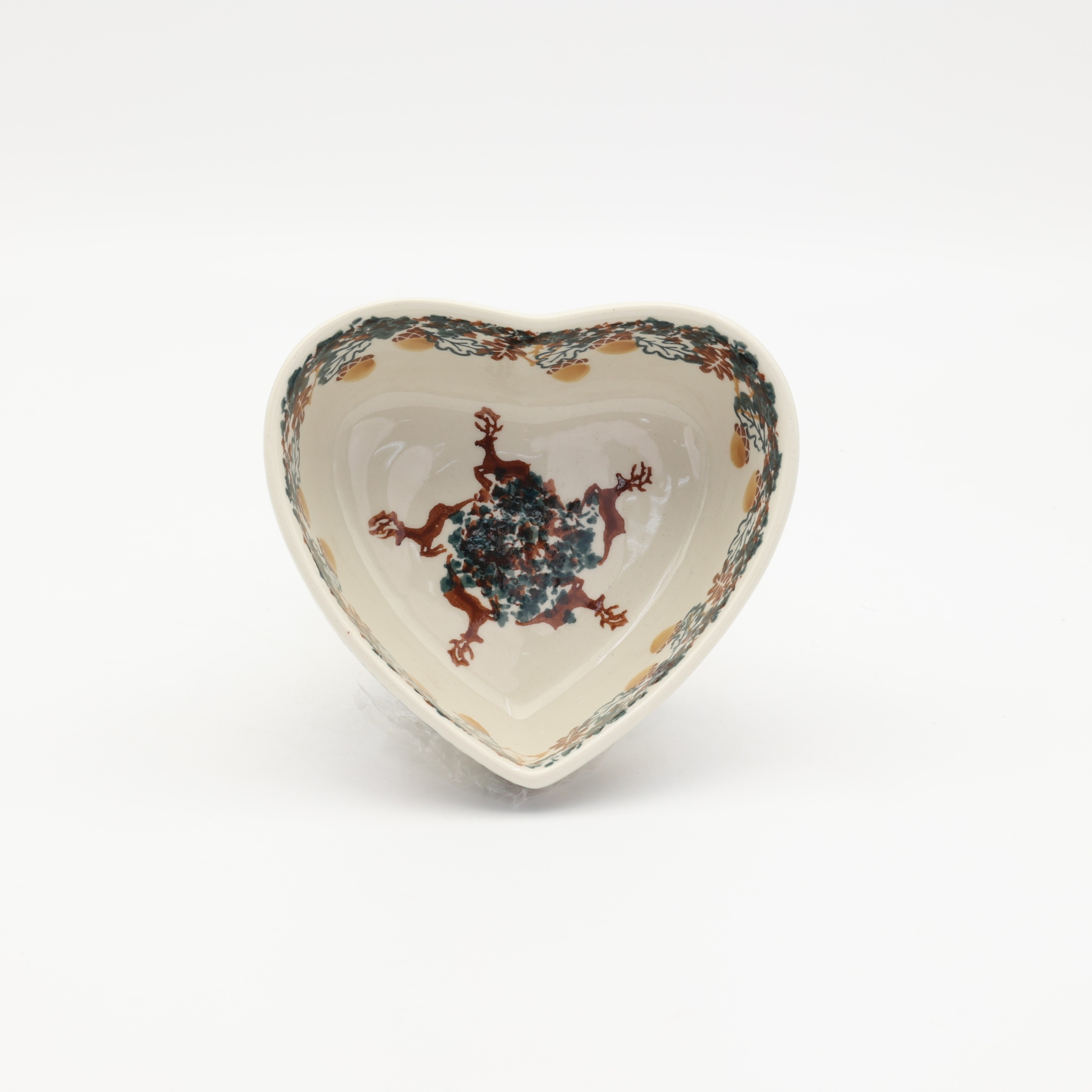 Heart-shaped Bolesławiec ceramic bowl.