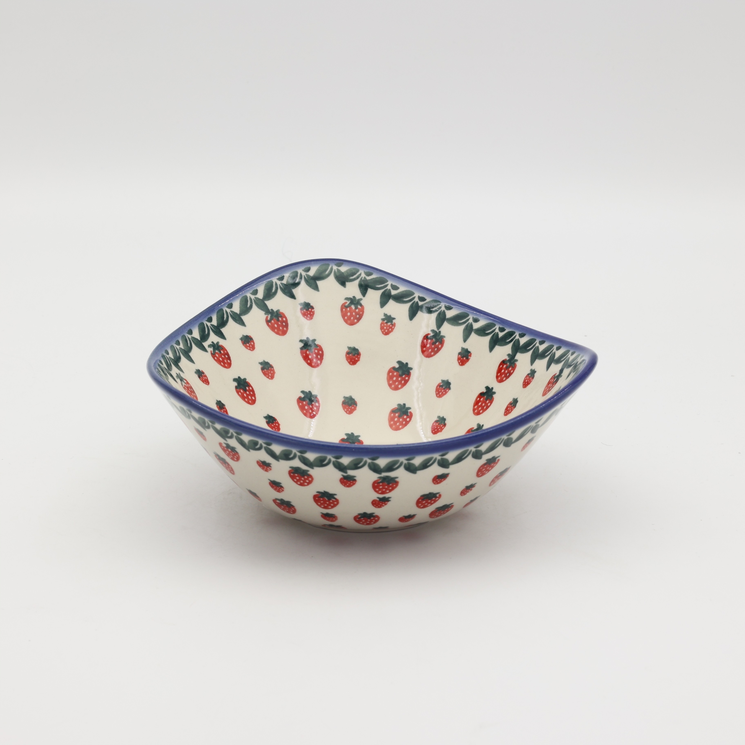 Handcrafted Bolesławiec ceramic bowl with traditional hand-painted pattern.