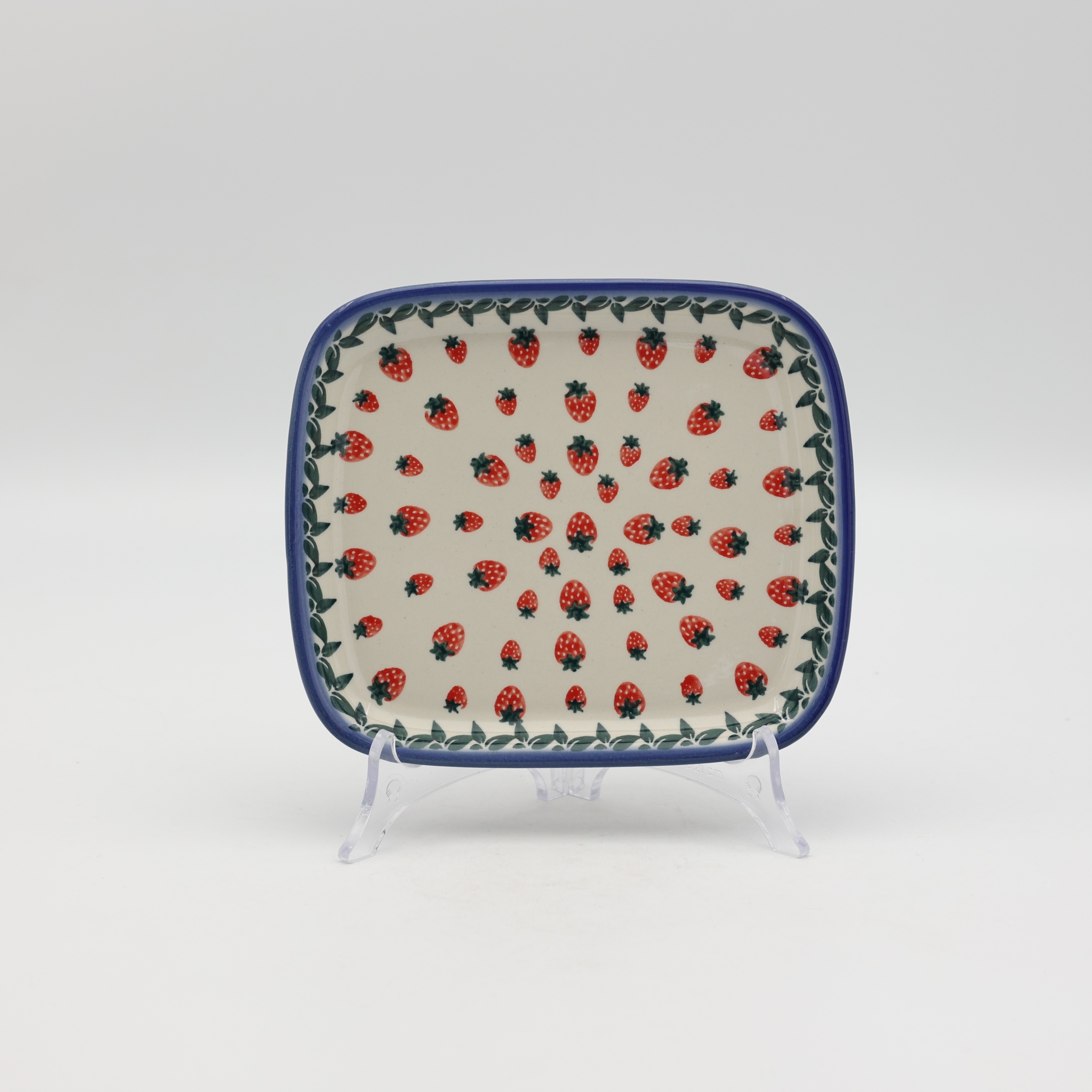Handcrafted rectangular Bolesławiec ceramic platter with traditional hand-painted pattern.