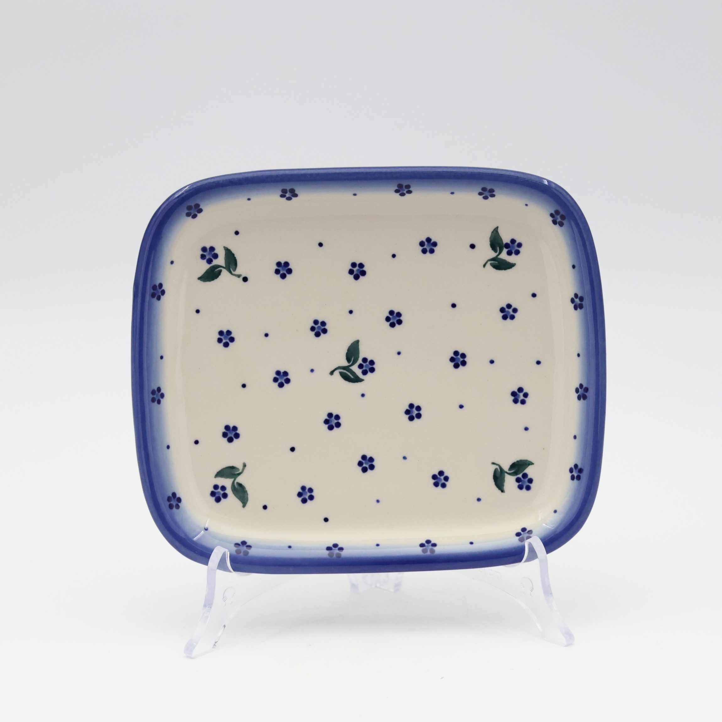 Handcrafted rectangular Bolesławiec ceramic platter with traditional hand-painted pattern.