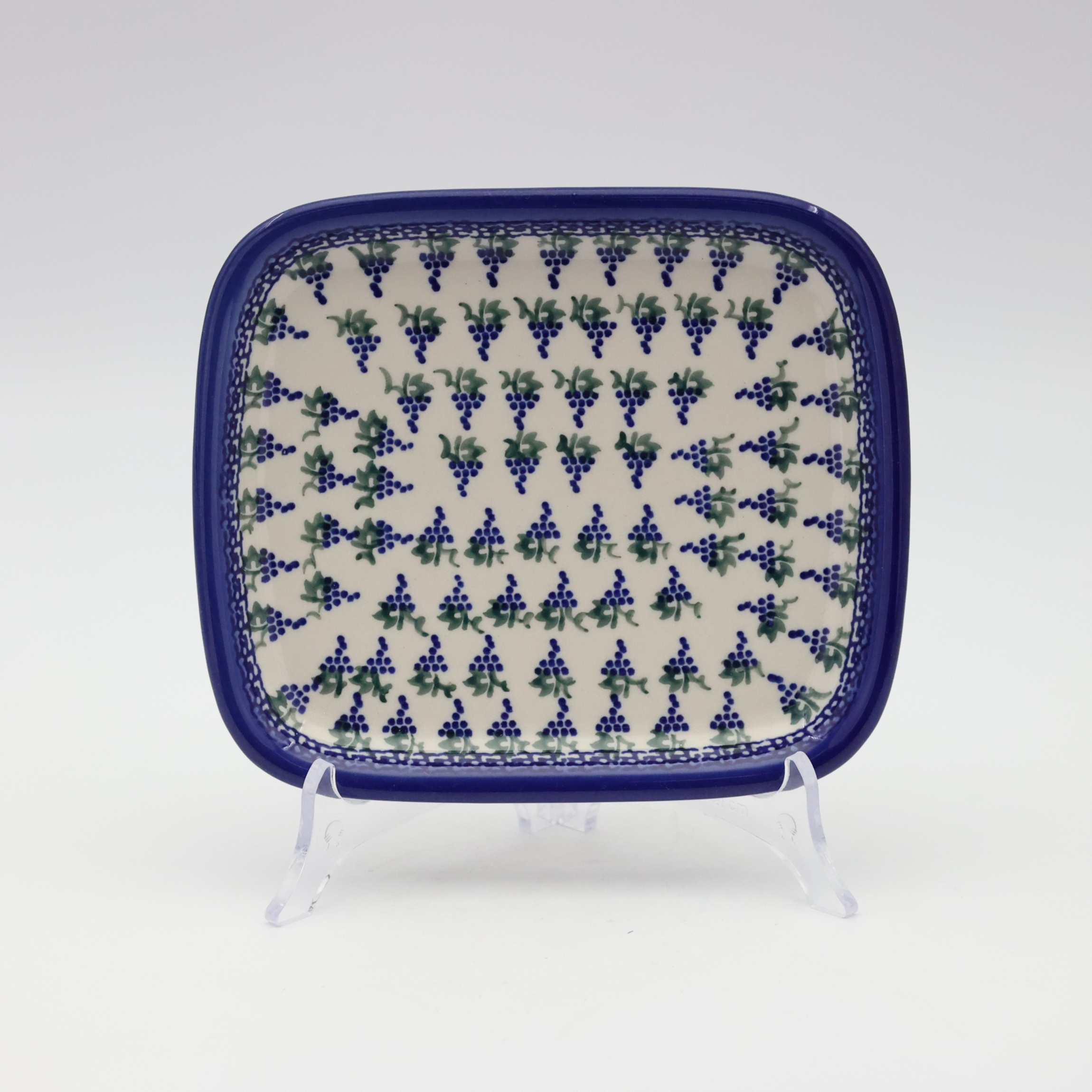 Handcrafted rectangular Bolesławiec ceramic platter with traditional hand-painted pattern.