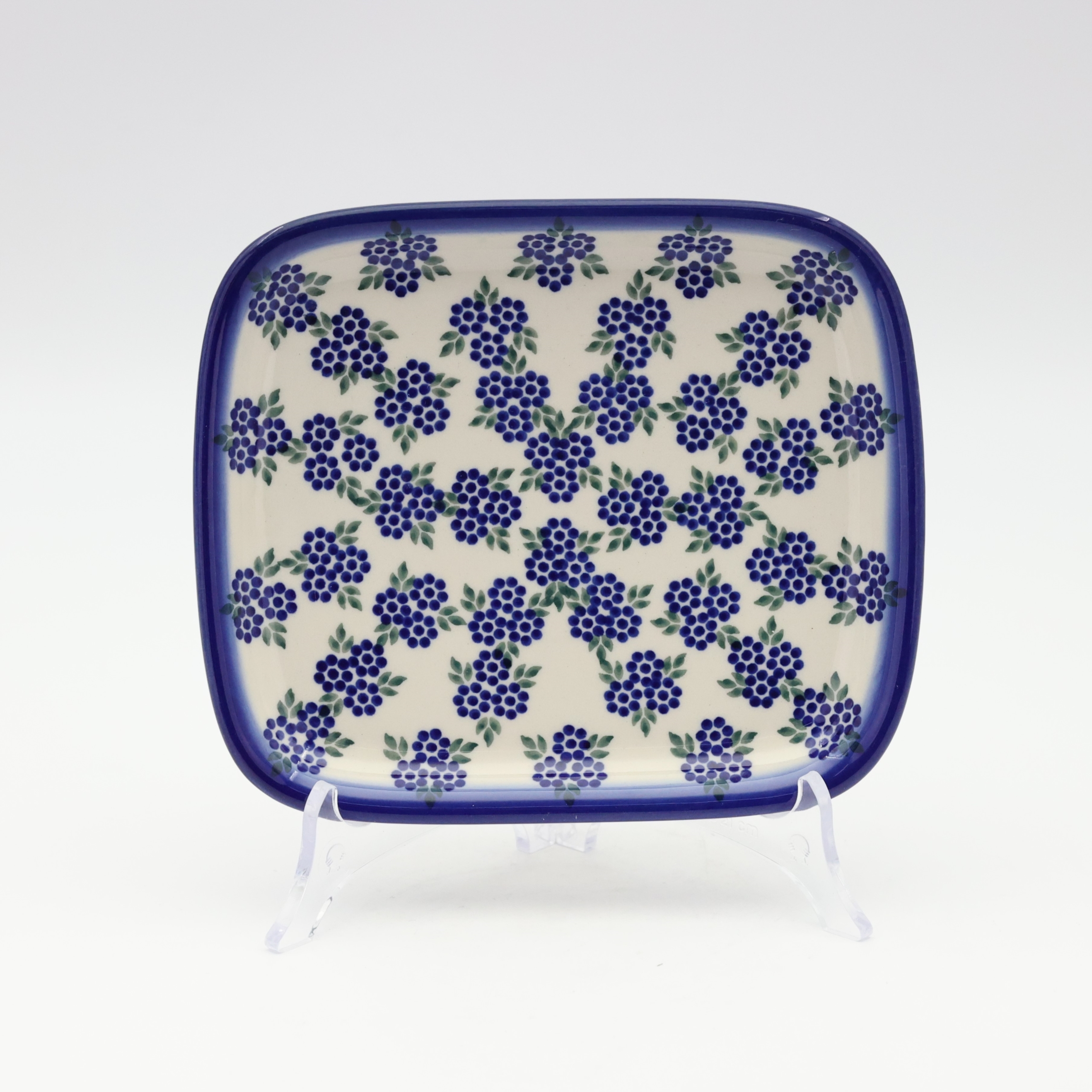 Handcrafted rectangular Bolesławiec ceramic platter with traditional hand-painted pattern.