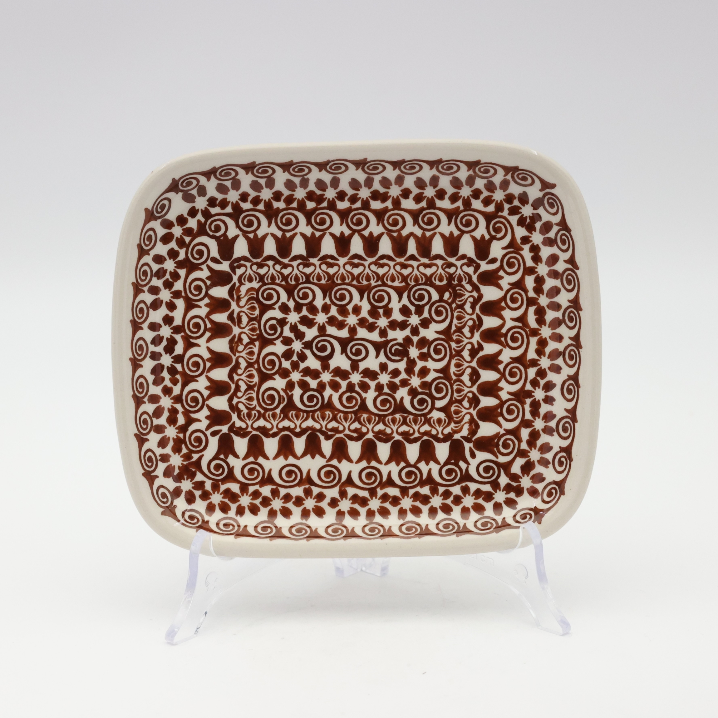 Handcrafted rectangular Bolesławiec ceramic platter with traditional hand-painted pattern.