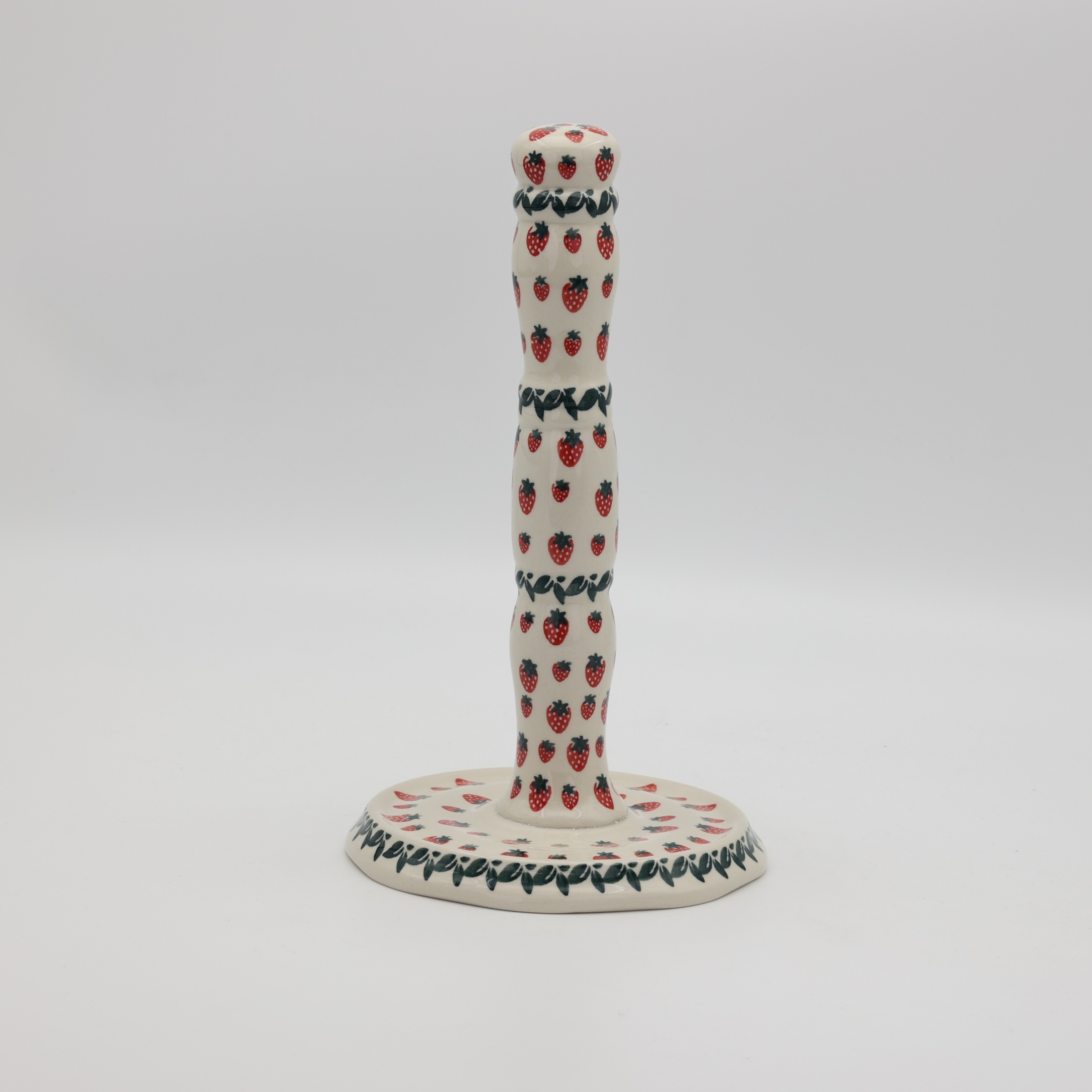 Handcrafted Bolesławiec ceramic paper towel holder.