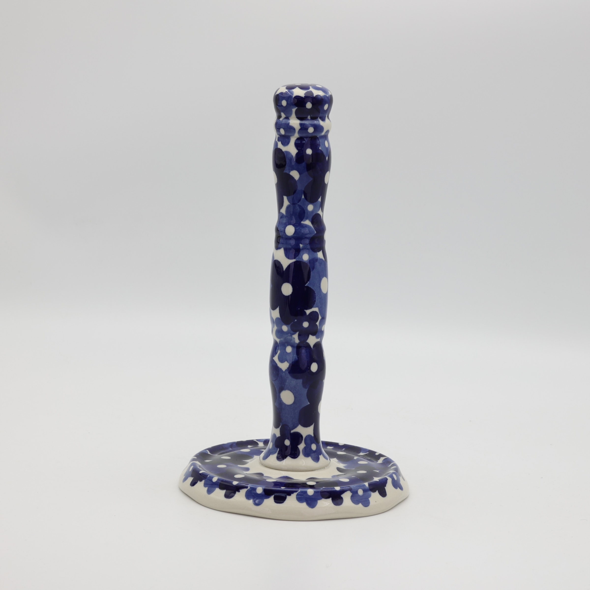 Handcrafted Bolesławiec ceramic paper towel holder.