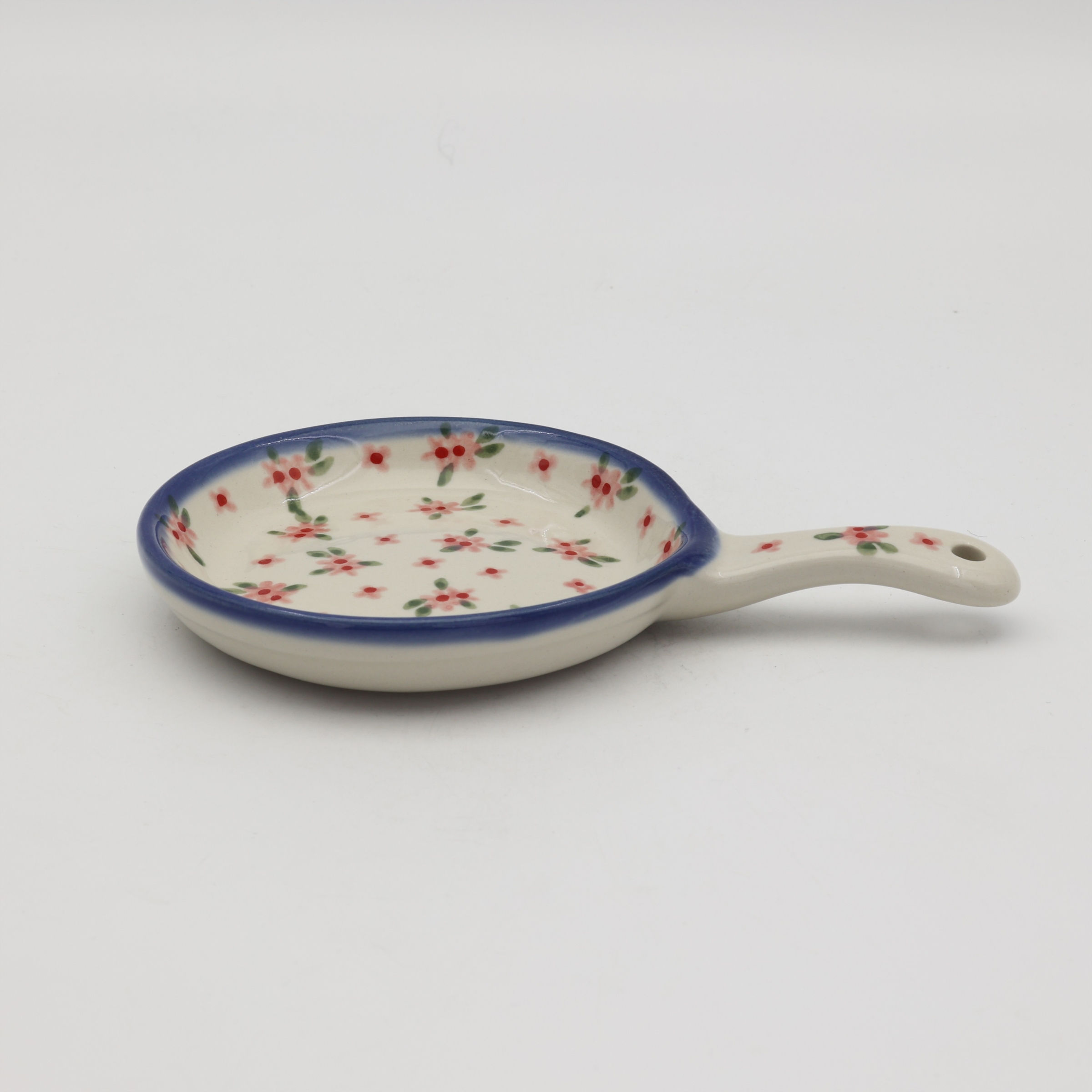Handcrafted small Bolesławiec ceramic skillet.