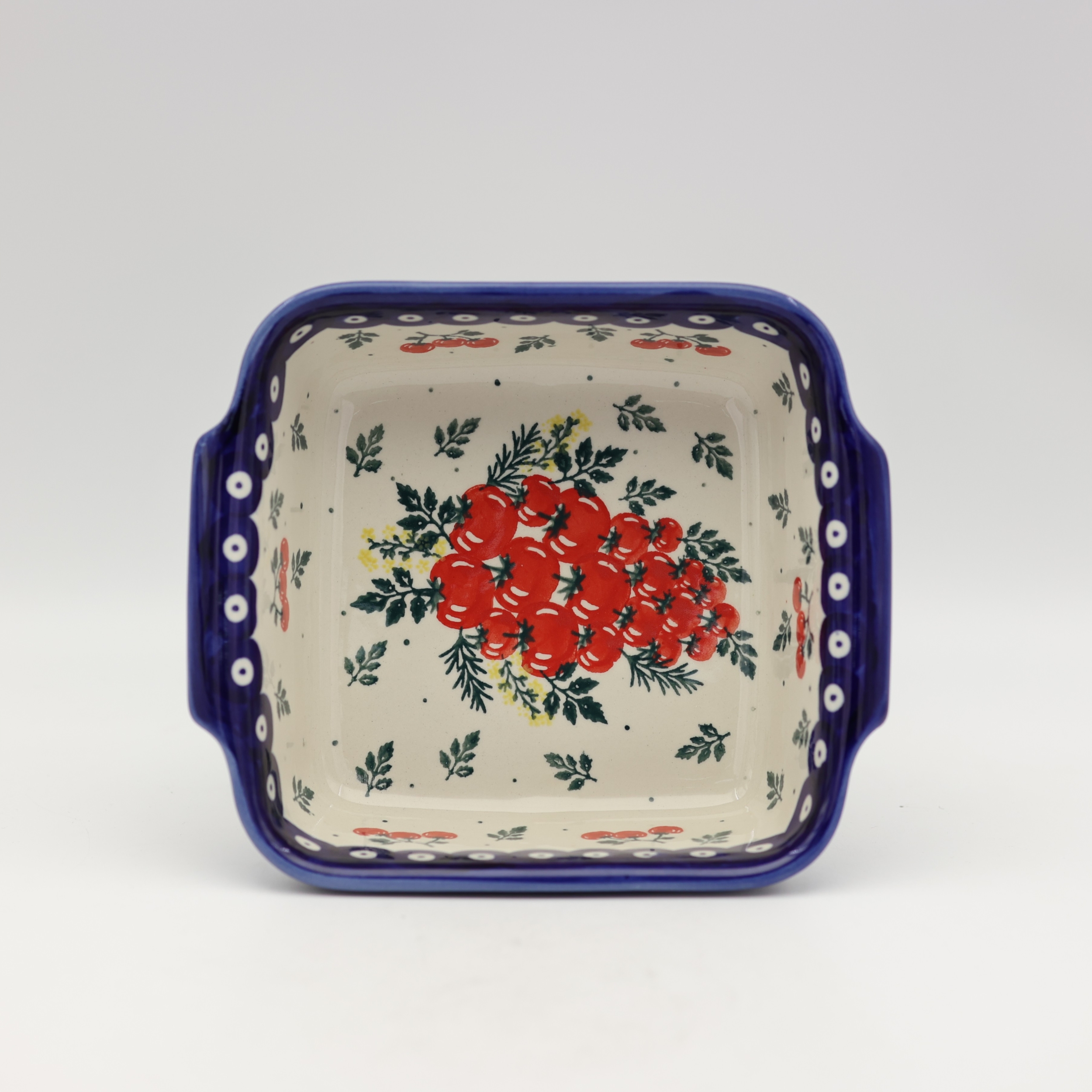 Small square ceramic dish ANDY featuring a vibrant hand-painted pattern.