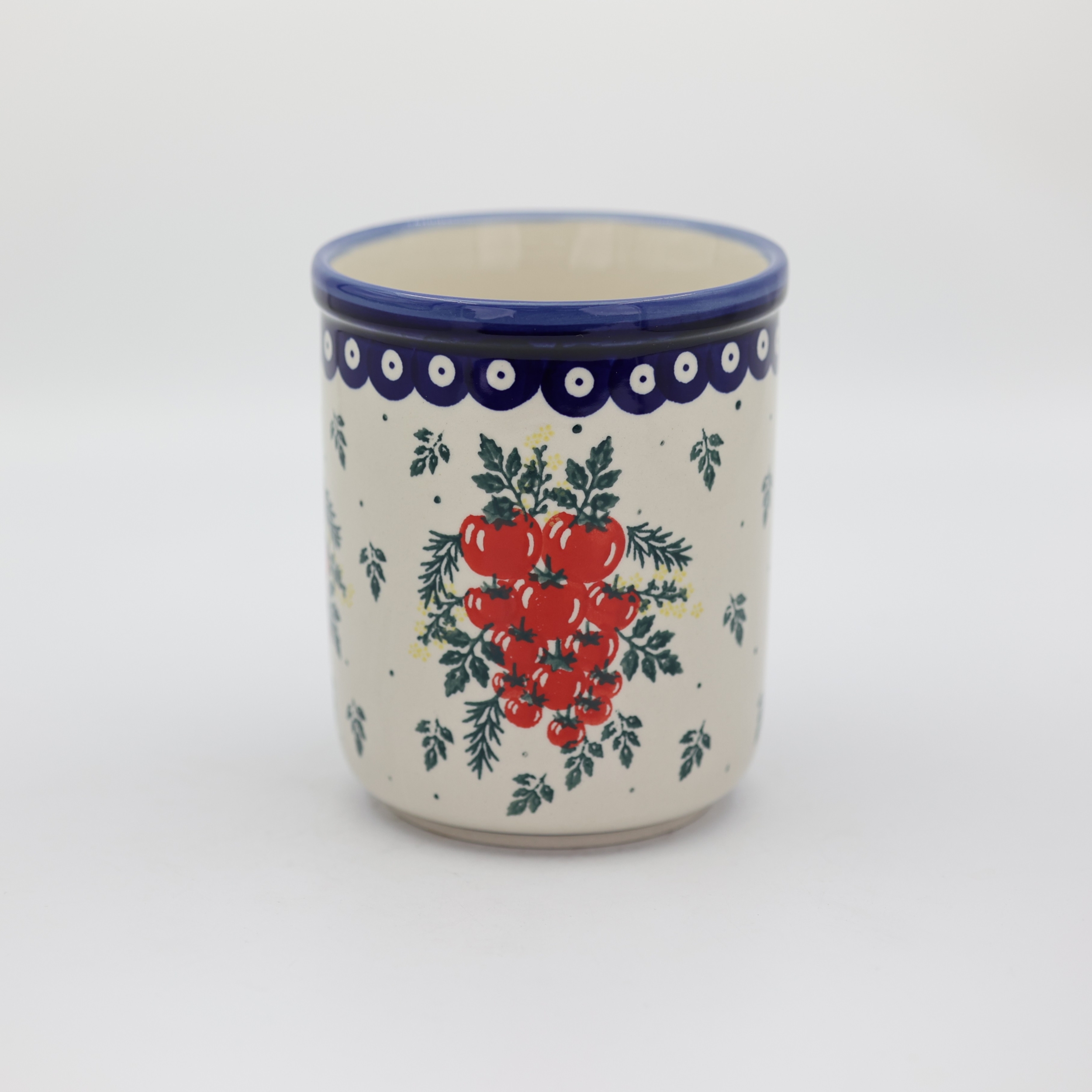 Large ceramic kitchen utensil holder featuring a vibrant hand-painted pattern.
